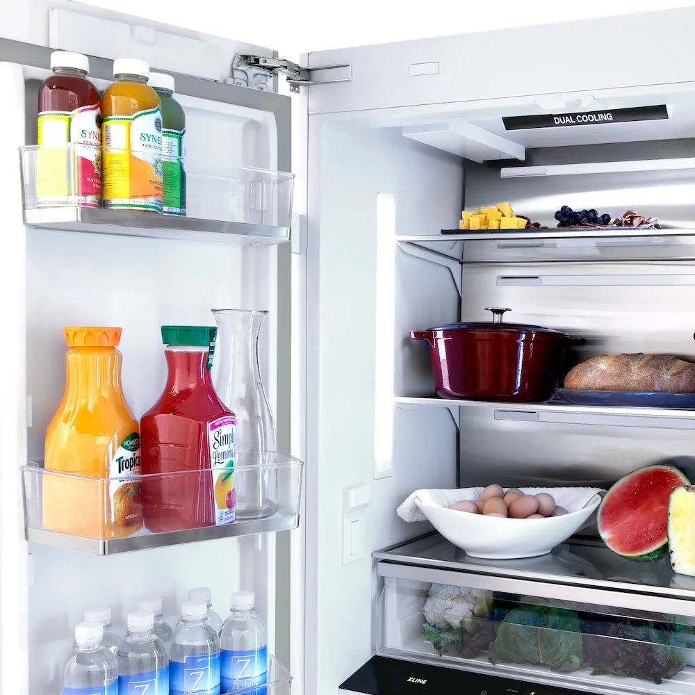 ZLINE Autograph Edition 36-inch refrigerator in satin stainless steel with bright white interior and polished gold accents RBIVZ-SN-36-G, detail