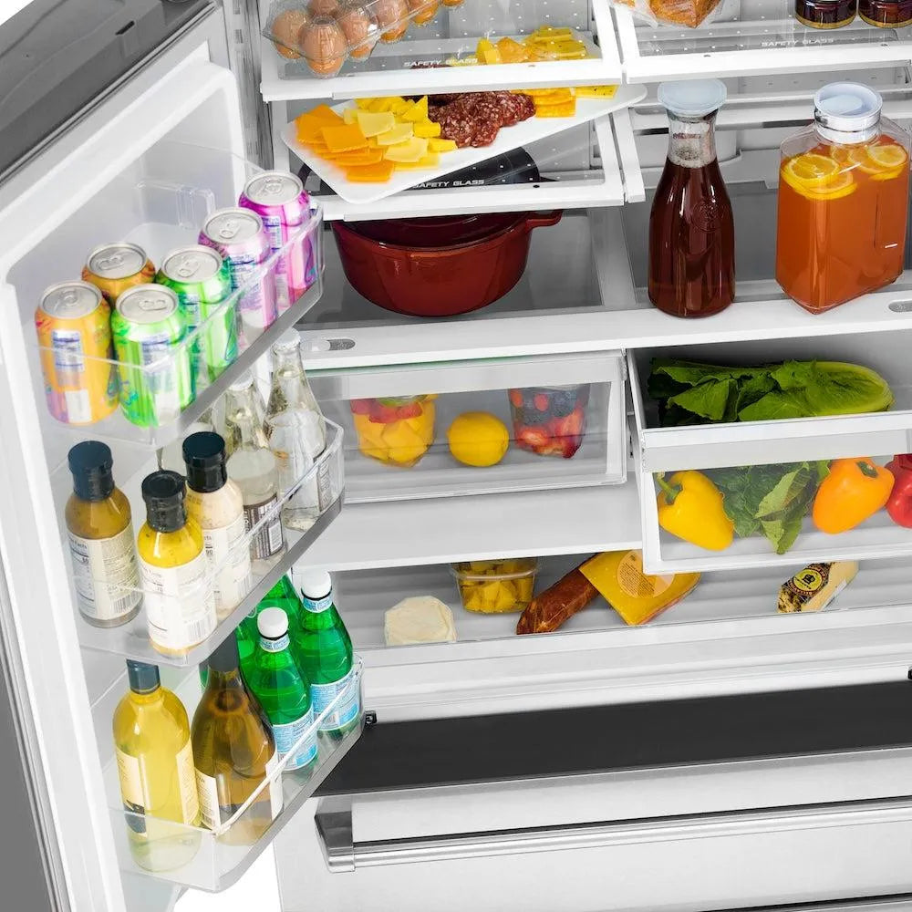 ZLINE Autograph Edition 36-inch refrigerator in fingerprint-resistant stainless steel with bright white interior and polished gold accents RFMZ-36-FG, door open