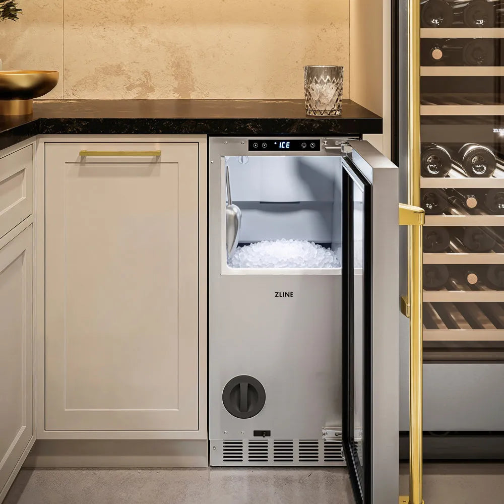 ZLINE Autograph Edition Touchstone 15-inch ice maker in stainless steel and polished gold accents INGDZ-ST-15-G, door open